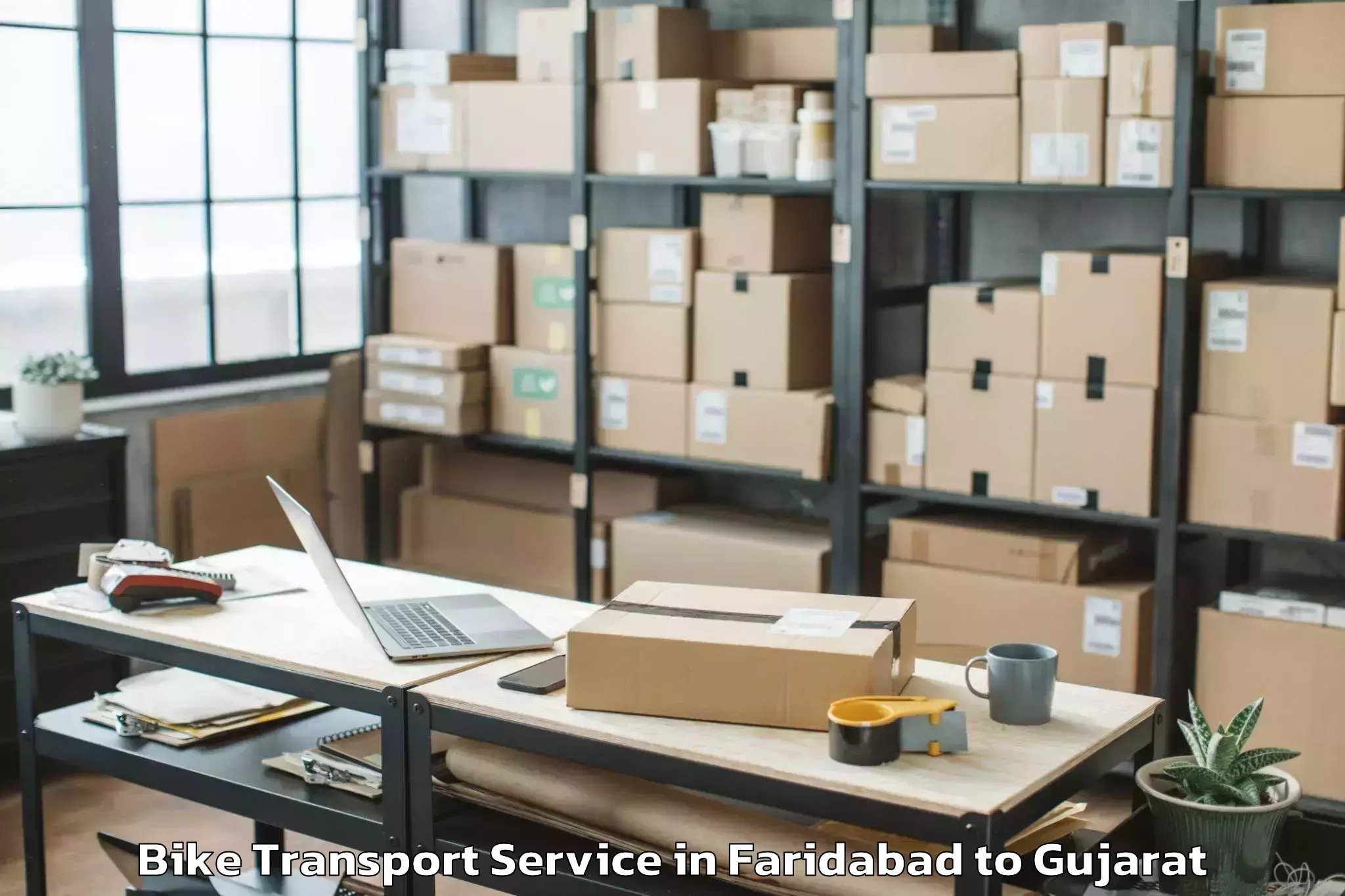 Top Faridabad to Kheda Bike Transport Available